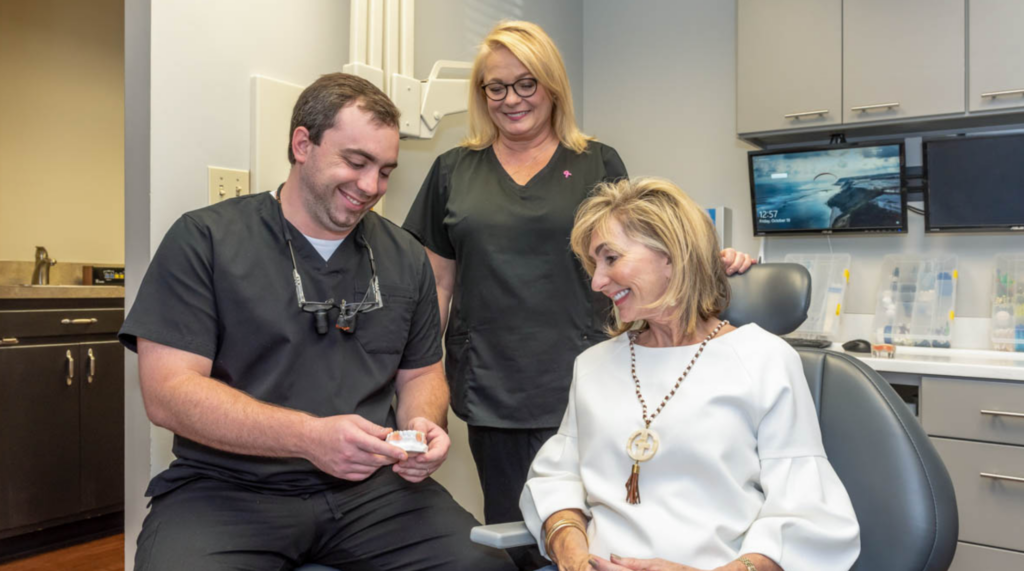 Dr. Reid Hill, dentist in Columbia, treating a patient