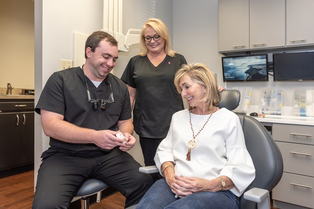 Dr. Reid Hill, dentist in Columbia, treating a patient